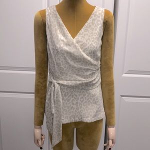 Women’s Express animal print top with side zip